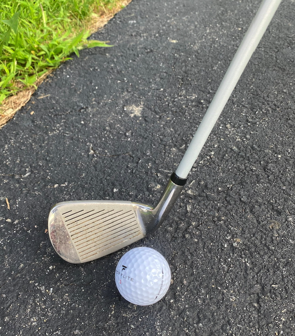 混凝土混凝土的高尔夫球杆和和高尔夫球