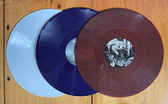 三张的唱片相互的，左边，中间，中间，右，右紫色